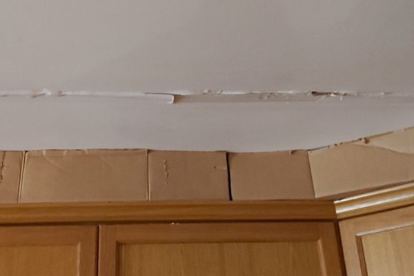 Roof Leak And Wall Painting Peeling In Need Of Repair