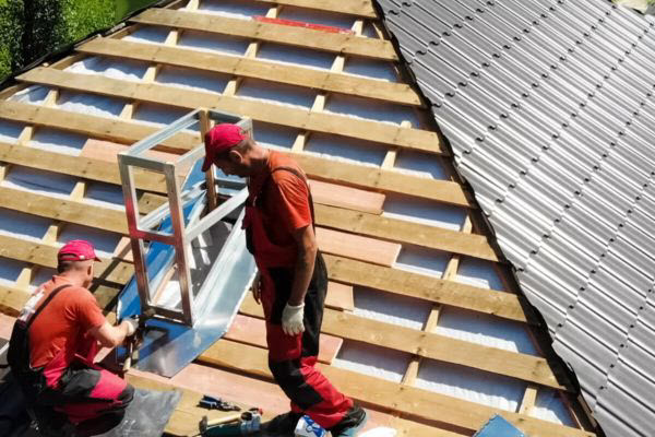 Roofers Doing Roof Ventilation Installation